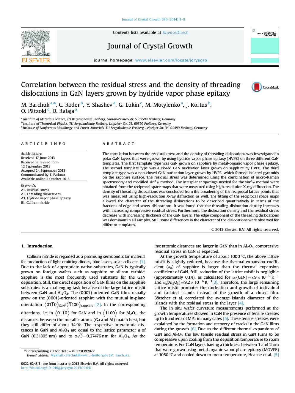 Correlation between the residual stress and the density of threading dislocations in GaN layers grown by hydride vapor phase epitaxy