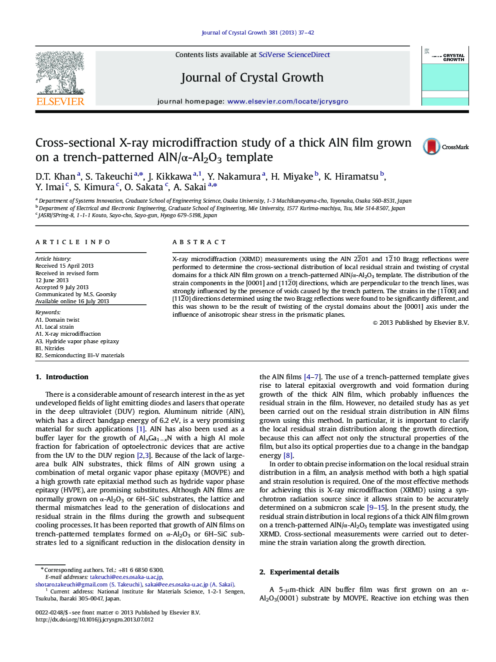 Cross-sectional X-ray microdiffraction study of a thick AlN film grown on a trench-patterned AlN/Î±-Al2O3 template