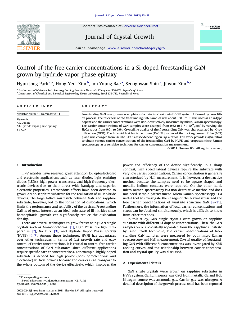 Control of the free carrier concentrations in a Si-doped freestanding GaN grown by hydride vapor phase epitaxy