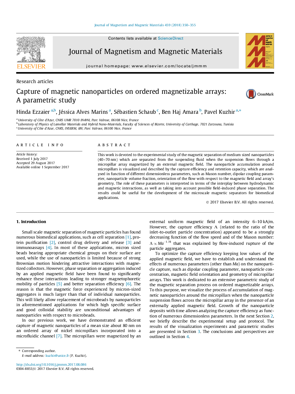 Capture of magnetic nanoparticles on ordered magnetizable arrays: A parametric study