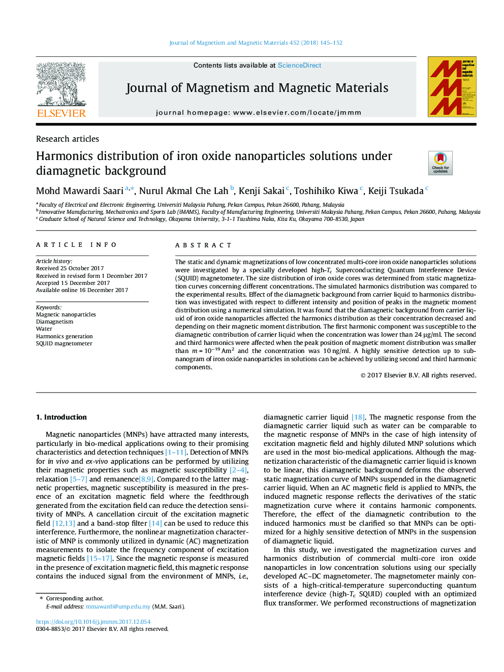 Harmonics distribution of iron oxide nanoparticles solutions under diamagnetic background