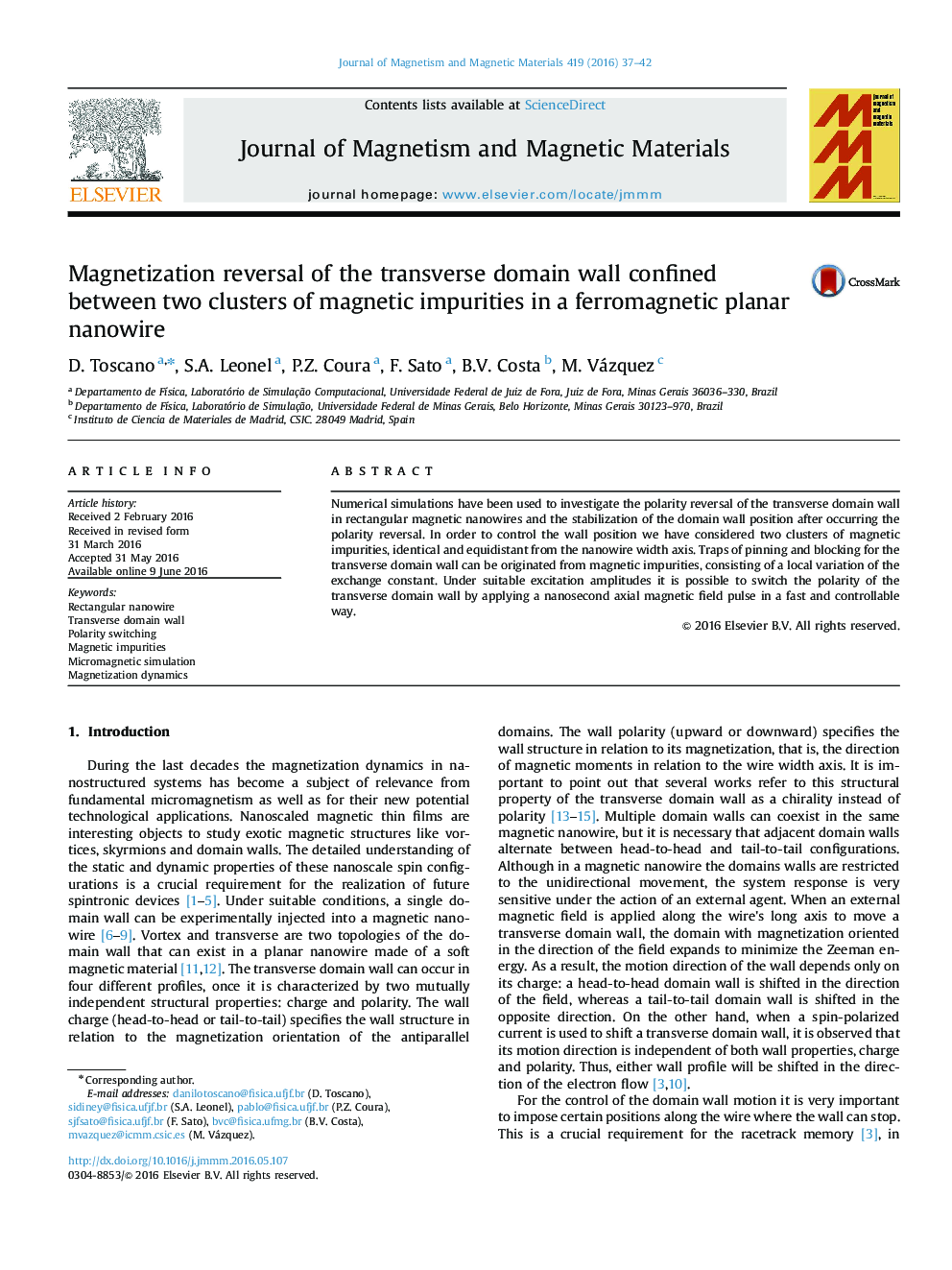 Magnetization reversal of the transverse domain wall confined between two clusters of magnetic impurities in a ferromagnetic planar nanowire