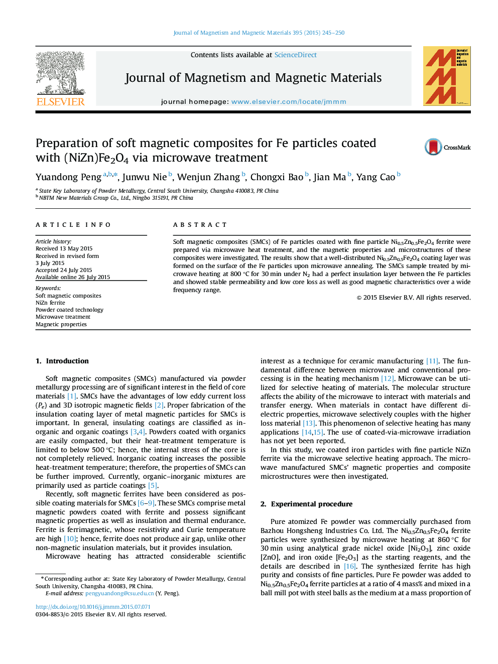 Preparation of soft magnetic composites for Fe particles coated with (NiZn)Fe2O4 via microwave treatment