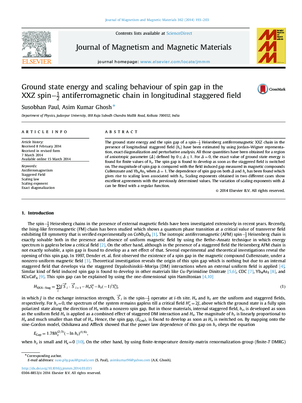 Ground state energy and scaling behaviour of spin gap in the XXZ spin-12 antiferromagnetic chain in longitudinal staggered field