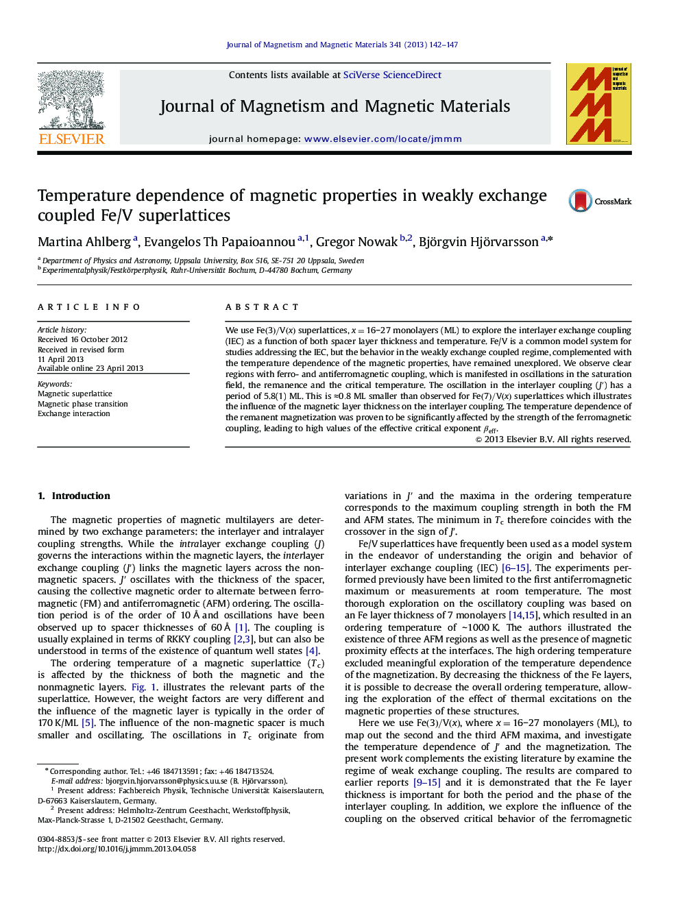 Temperature dependence of magnetic properties in weakly exchange coupled Fe/V superlattices