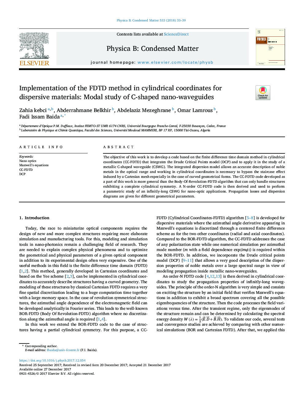 Implementation of the FDTD method in cylindrical coordinates for dispersive materials: Modal study of C-shaped nano-waveguides