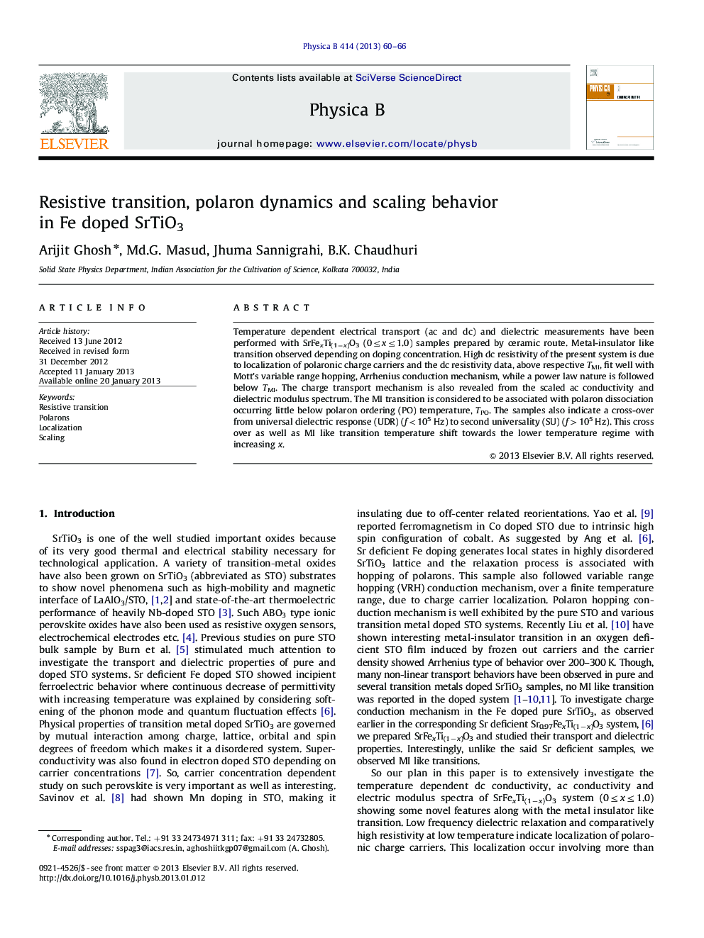 Resistive transition, polaron dynamics and scaling behavior in Fe doped SrTiO3