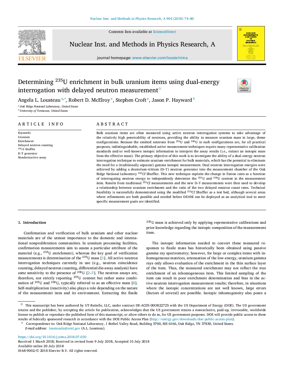 Determining 235U enrichment in bulk uranium items using dual-energy interrogation with delayed neutron measurement