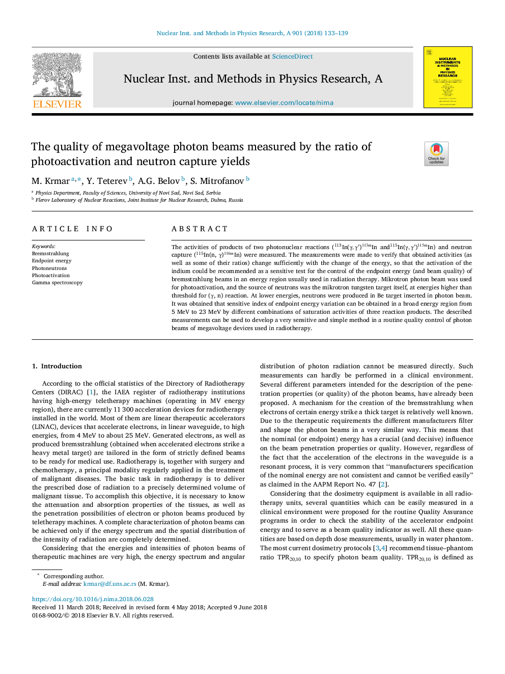 The quality of megavoltage photon beams measured by the ratio of photoactivation and neutron capture yields