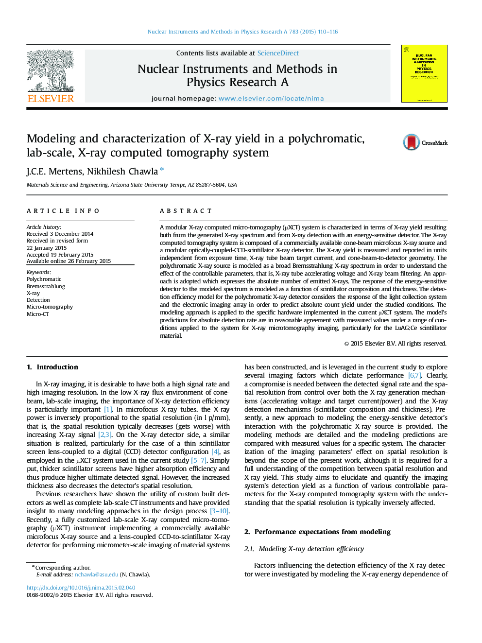 Modeling and characterization of X-ray yield in a polychromatic, lab-scale, X-ray computed tomography system