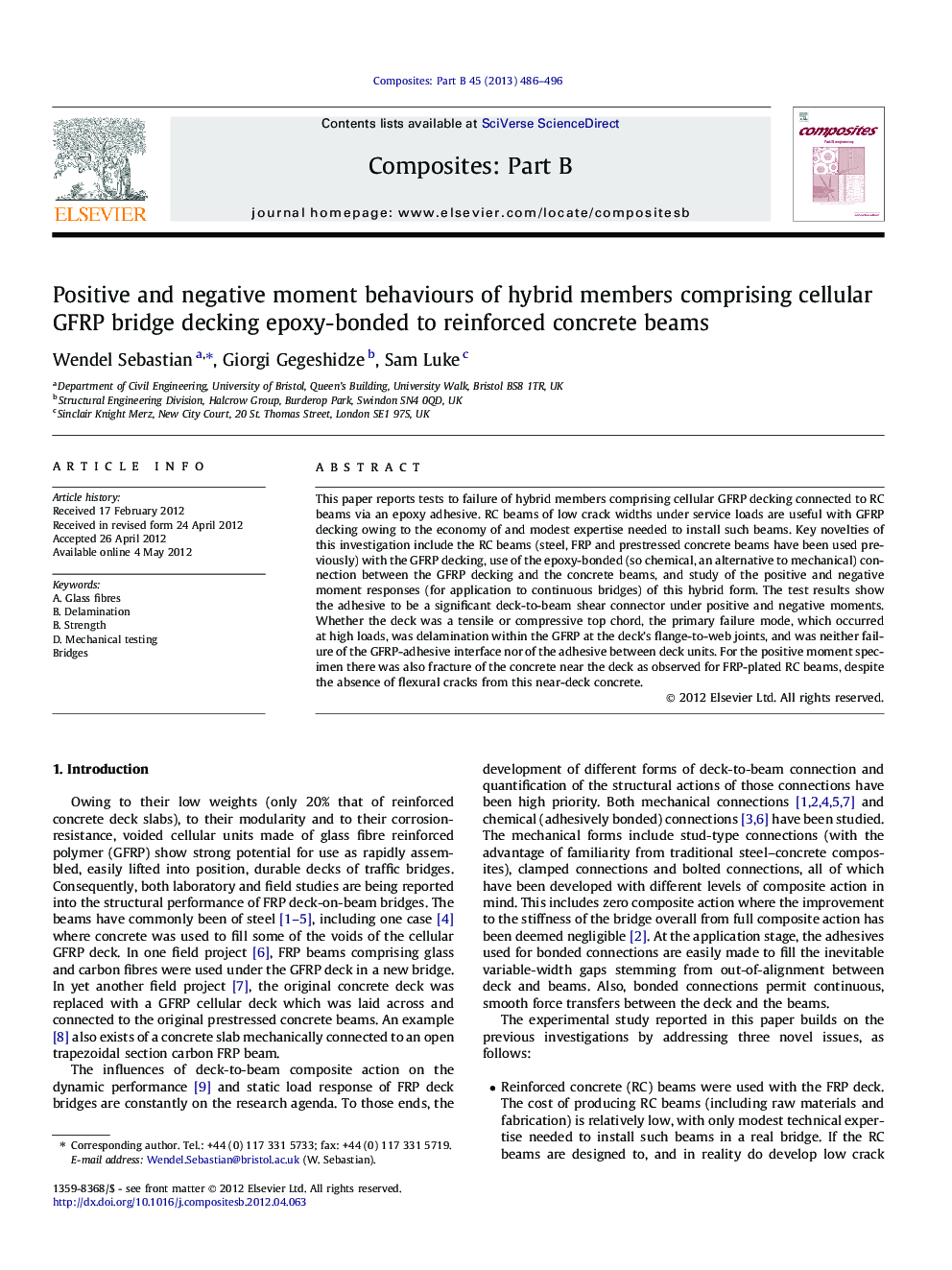 Positive and negative moment behaviours of hybrid members comprising cellular GFRP bridge decking epoxy-bonded to reinforced concrete beams