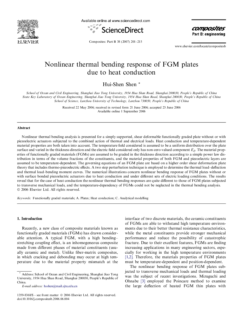 Nonlinear thermal bending response of FGM plates due to heat conduction