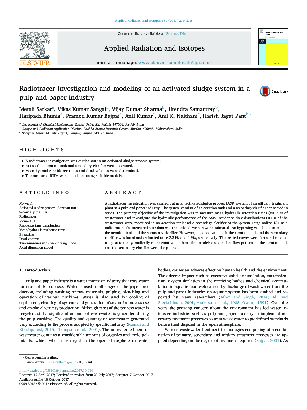 Radiotracer investigation and modeling of an activated sludge system in a pulp and paper industry