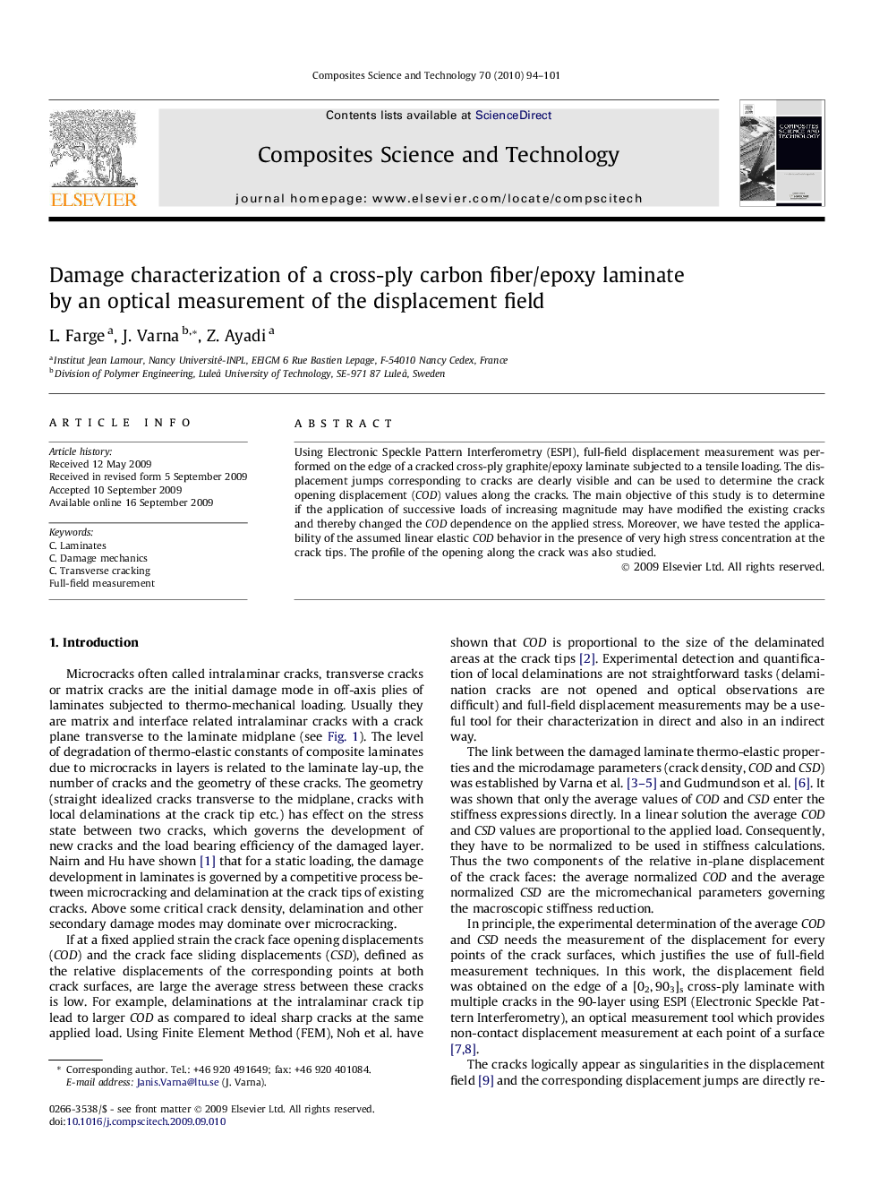 Damage characterization of a cross-ply carbon fiber/epoxy laminate by an optical measurement of the displacement field