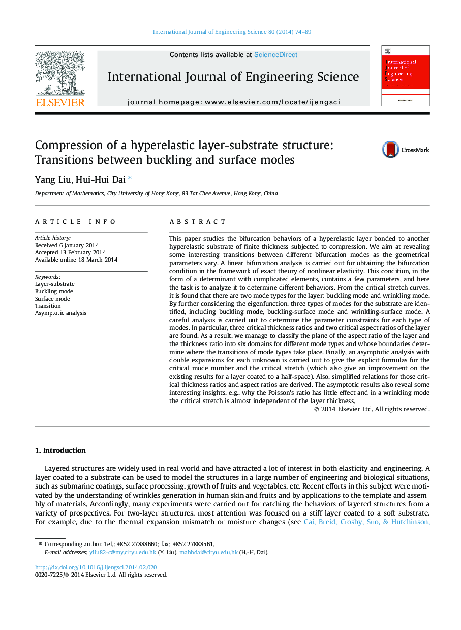 Compression of a hyperelastic layer-substrate structure: Transitions between buckling and surface modes