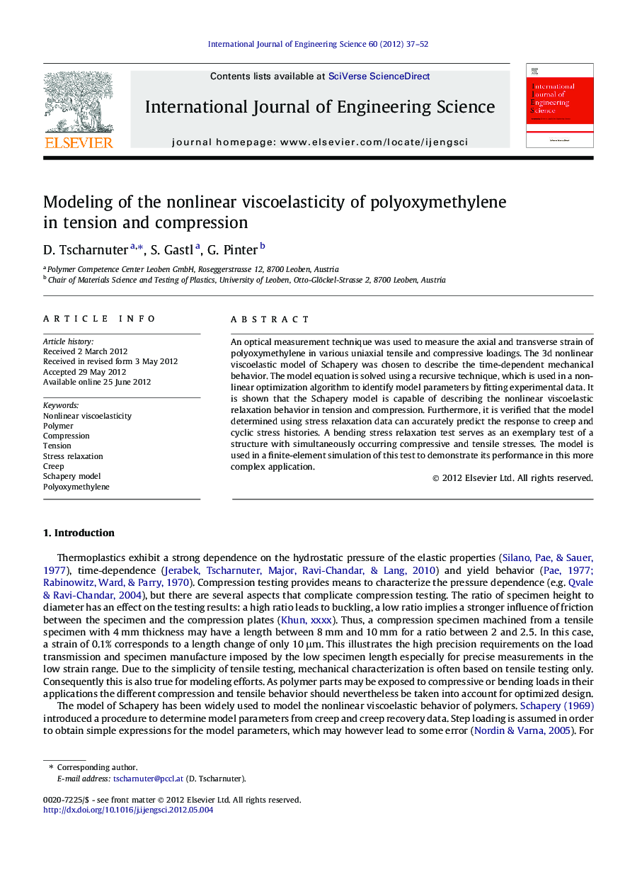 Modeling of the nonlinear viscoelasticity of polyoxymethylene in tension and compression