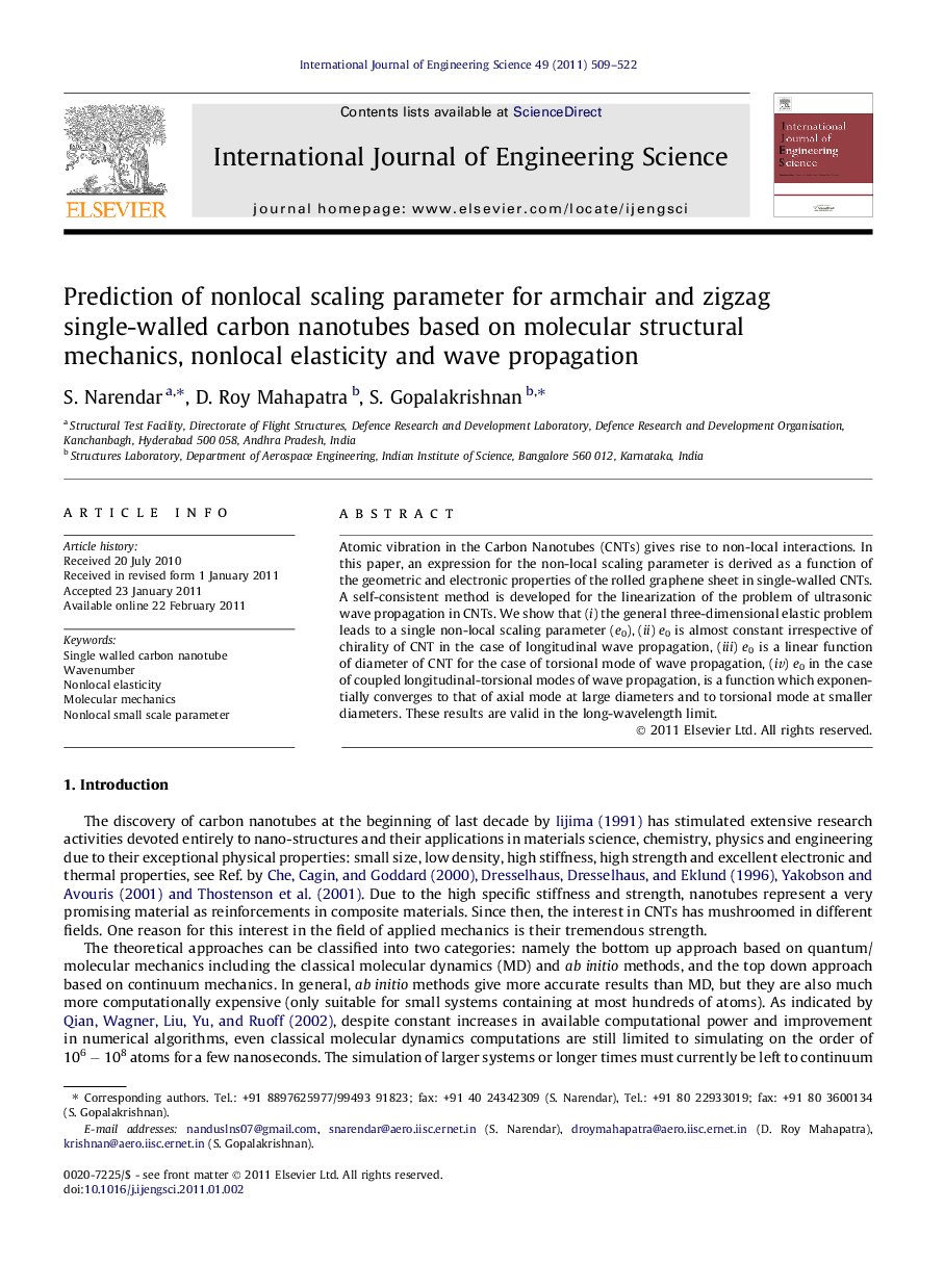 Prediction of nonlocal scaling parameter for armchair and zigzag single-walled carbon nanotubes based on molecular structural mechanics, nonlocal elasticity and wave propagation