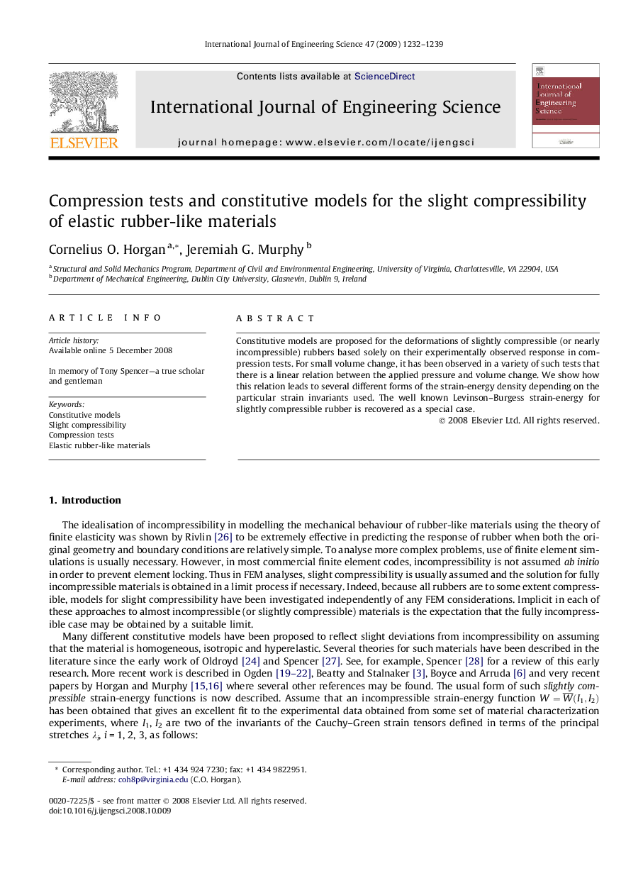 Compression tests and constitutive models for the slight compressibility of elastic rubber-like materials