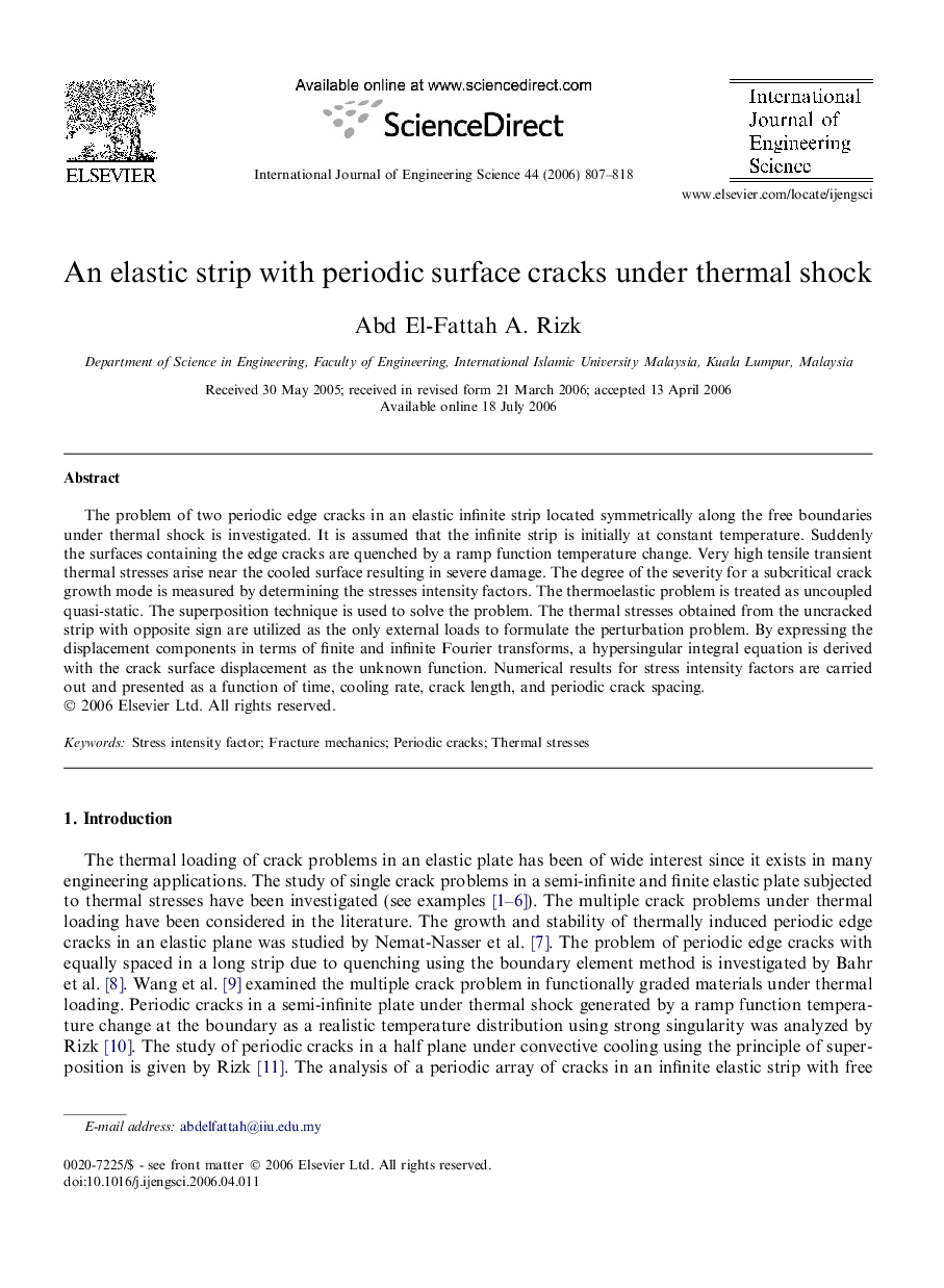 An elastic strip with periodic surface cracks under thermal shock