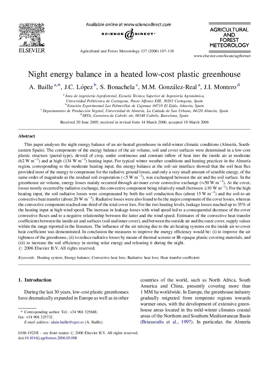 Night energy balance in a heated low-cost plastic greenhouse