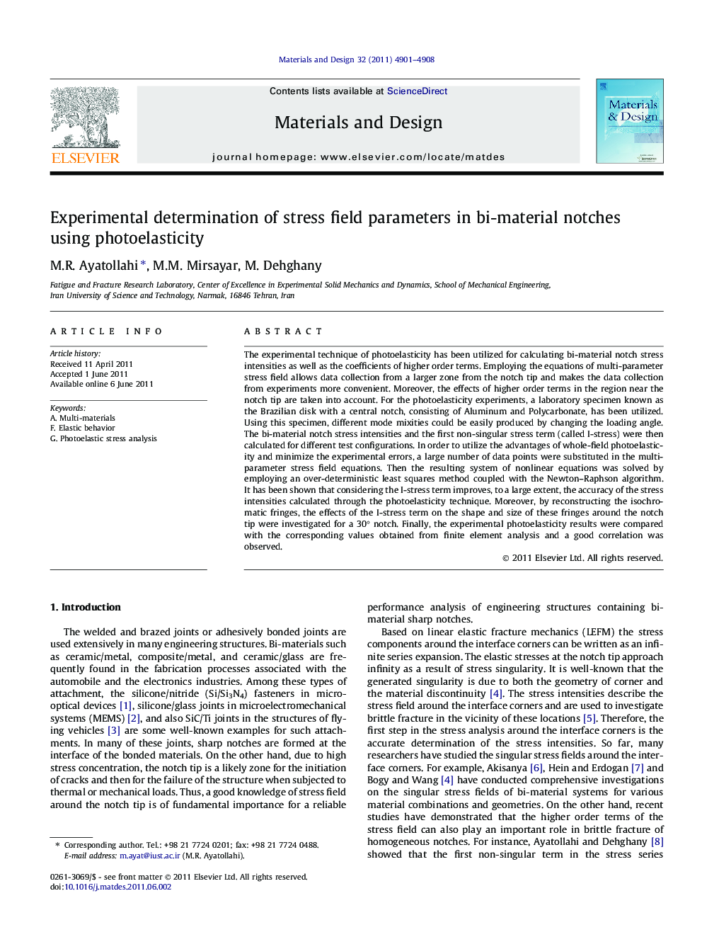 Experimental determination of stress field parameters in bi-material notches using photoelasticity