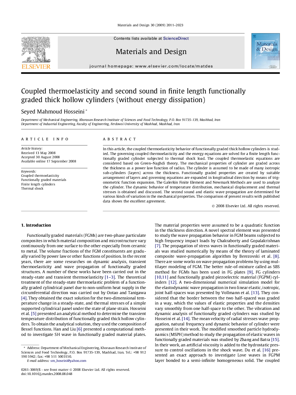 Coupled thermoelasticity and second sound in finite length functionally graded thick hollow cylinders (without energy dissipation)