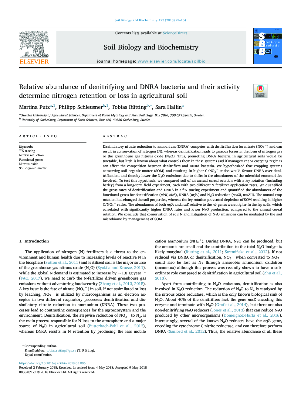 Relative abundance of denitrifying and DNRA bacteria and their activity determine nitrogen retention or loss in agricultural soil