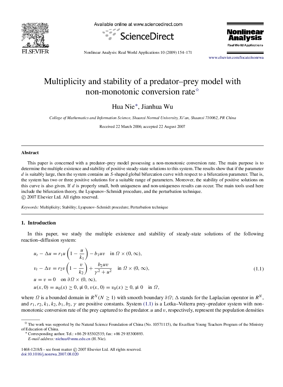 Multiplicity and stability of a predator–prey model with non-monotonic conversion rate 