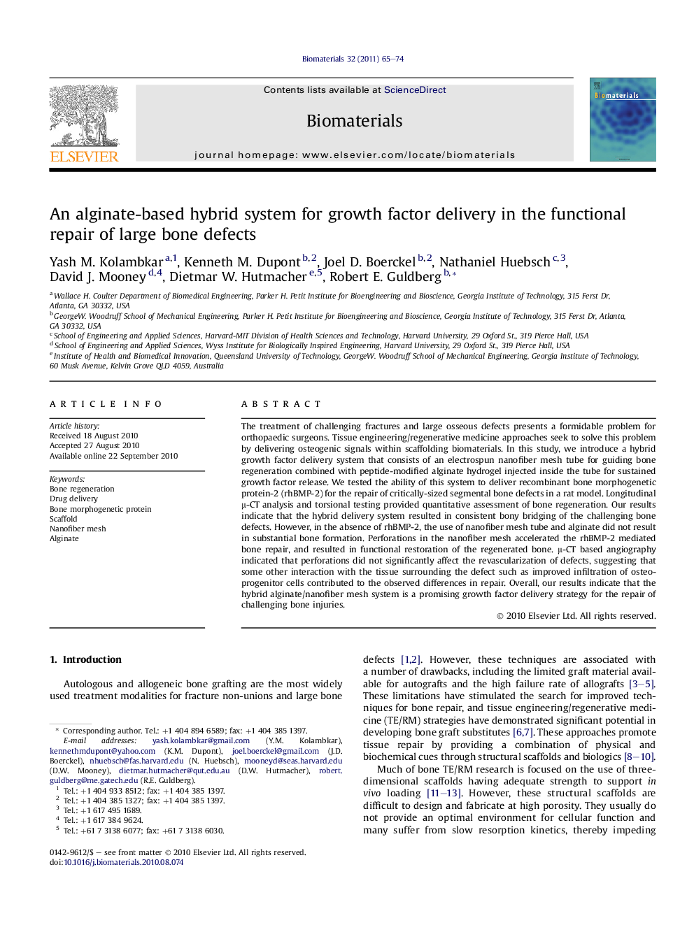 An alginate-based hybrid system for growth factor delivery in the functional repair of large bone defects