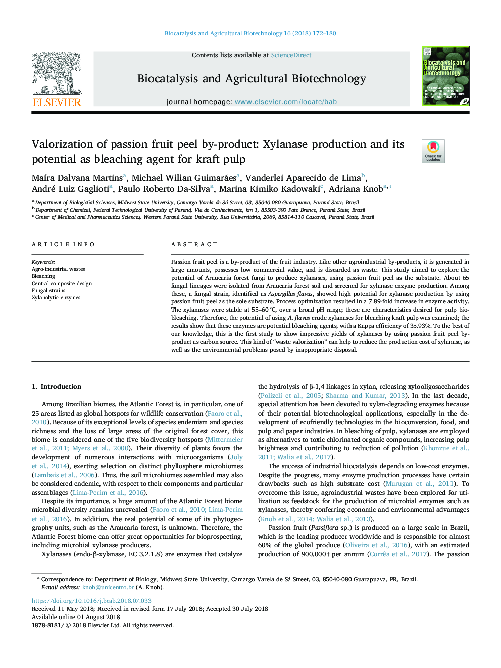 Valorization of passion fruit peel by-product: Xylanase production and its potential as bleaching agent for kraft pulp