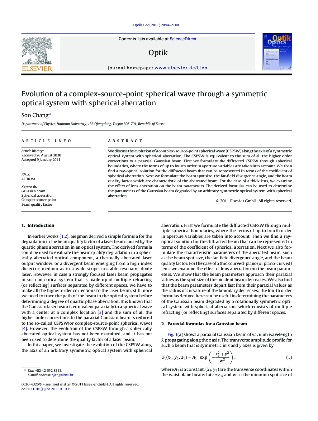 Evolution of a complex-source-point spherical wave through a symmetric optical system with spherical aberration