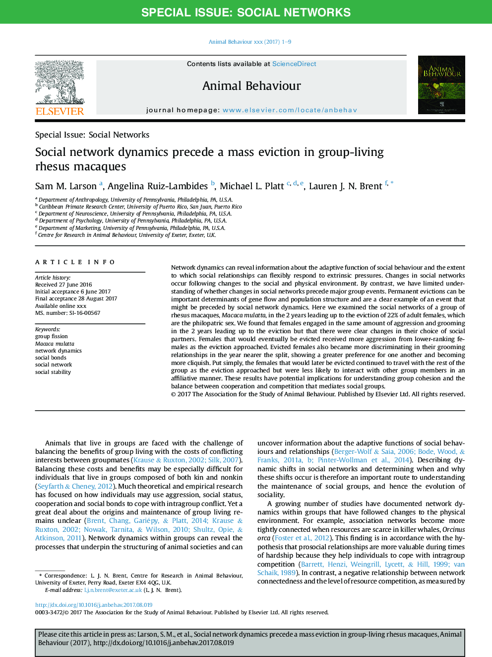 Social network dynamics precede a mass eviction in group-living rhesus macaques