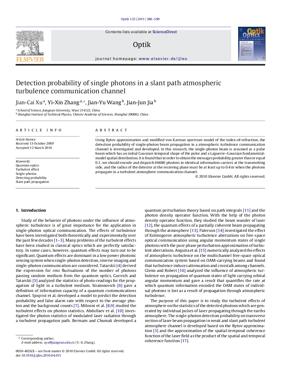 Detection probability of single photons in a slant path atmospheric turbulence communication channel