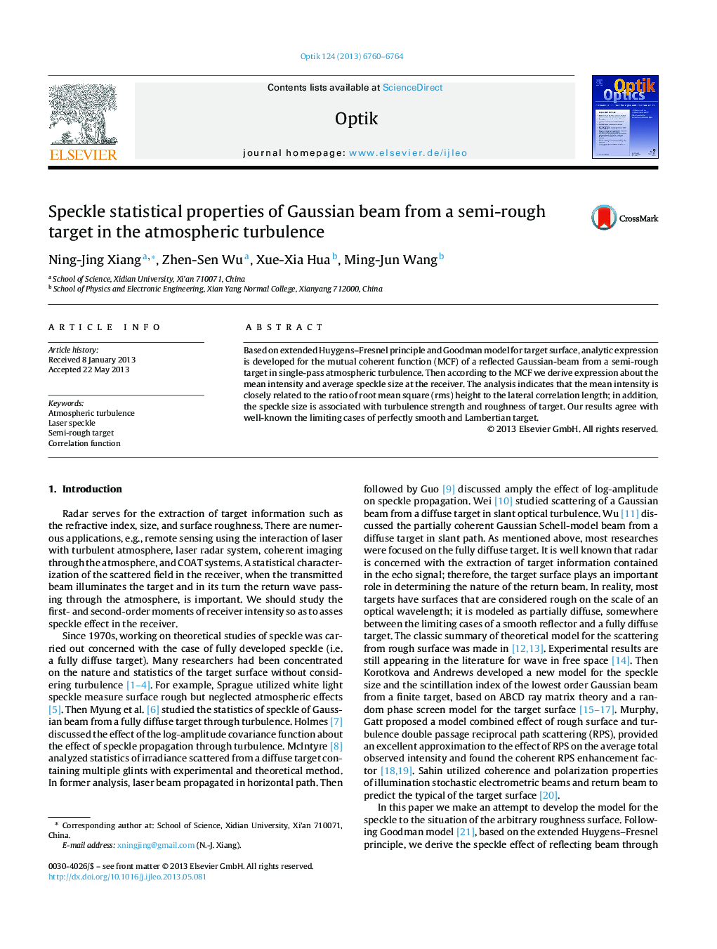 Speckle statistical properties of Gaussian beam from a semi-rough target in the atmospheric turbulence