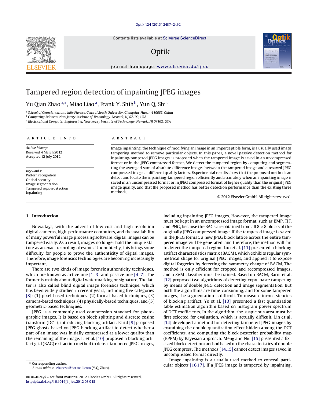 Tampered region detection of inpainting JPEG images