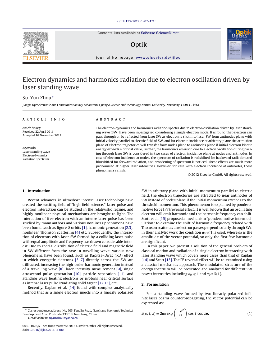 Electron dynamics and harmonics radiation due to electron oscillation driven by laser standing wave