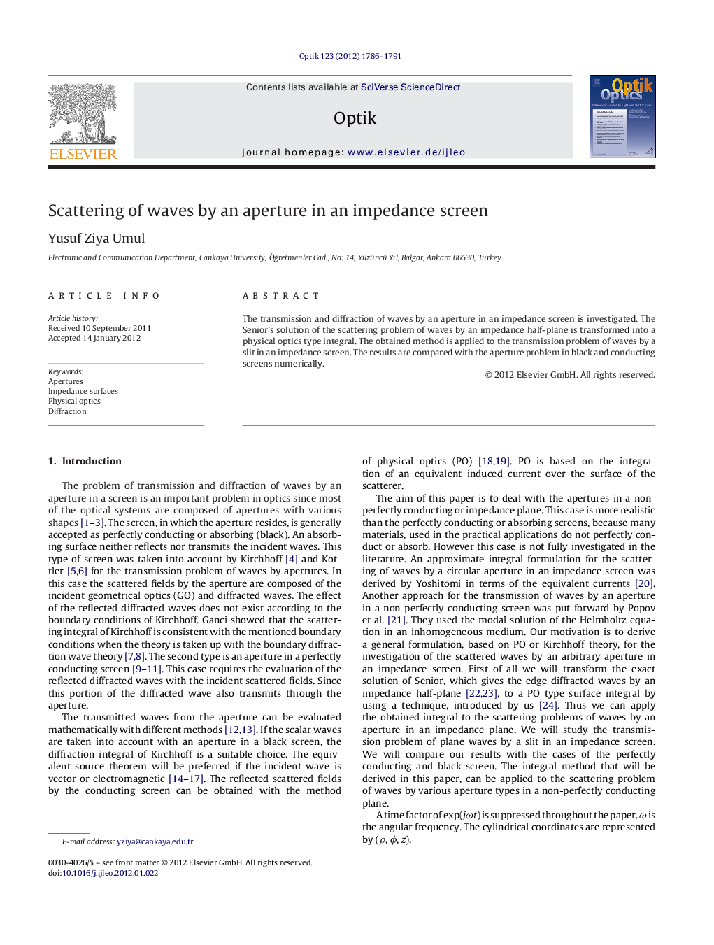 Scattering of waves by an aperture in an impedance screen