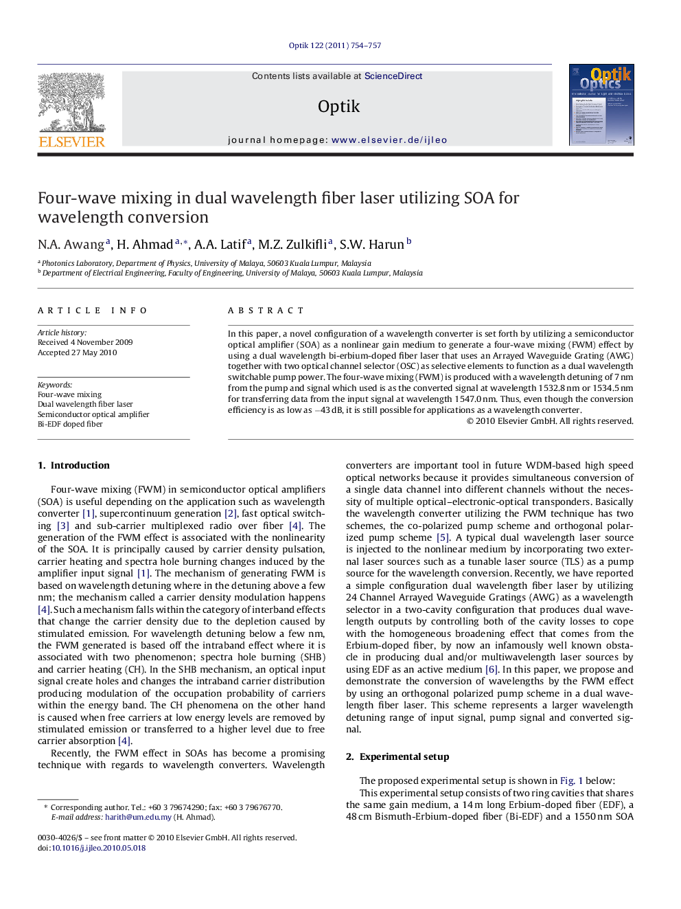 Four-wave mixing in dual wavelength fiber laser utilizing SOA for wavelength conversion