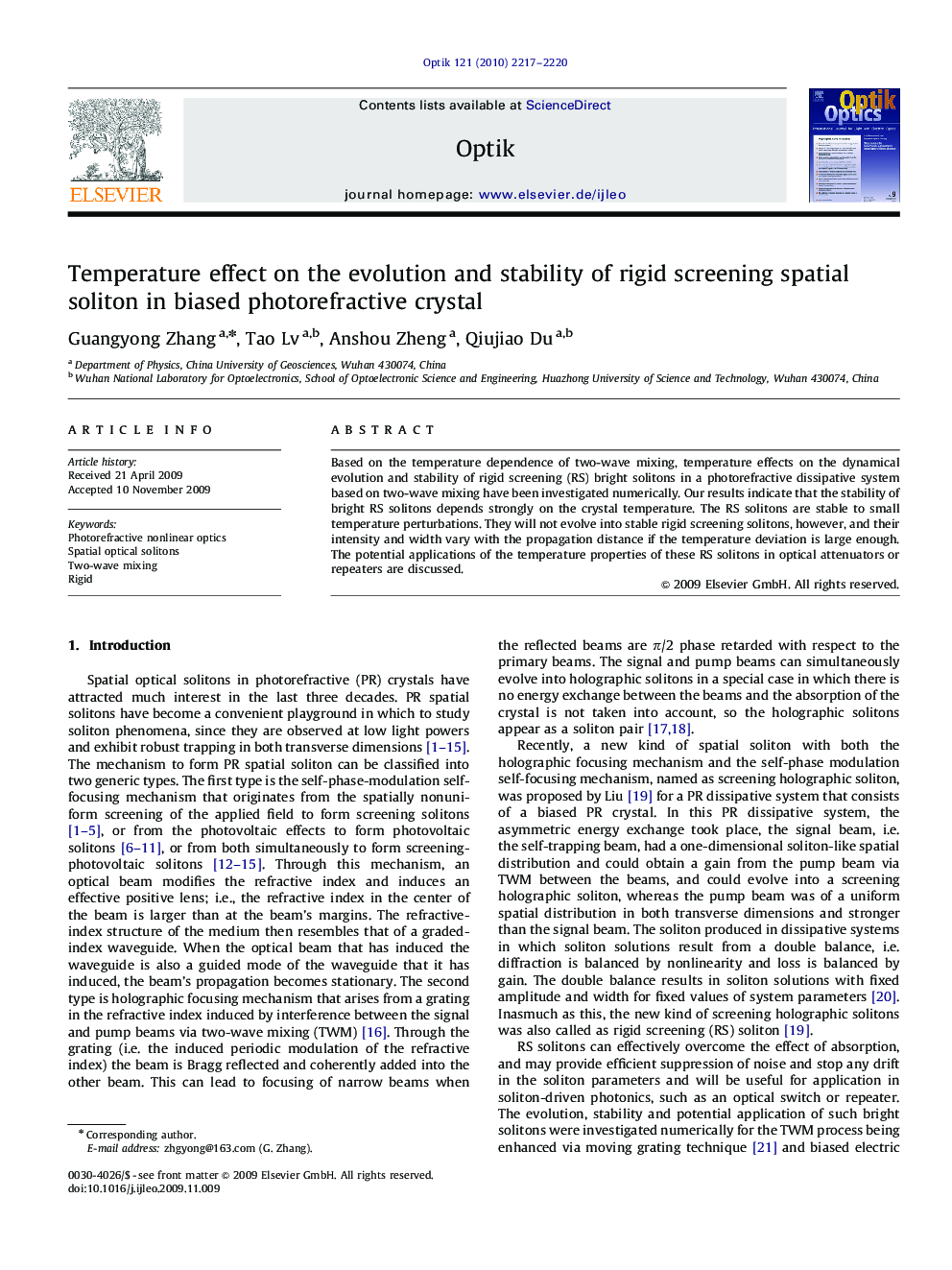 Temperature effect on the evolution and stability of rigid screening spatial soliton in biased photorefractive crystal