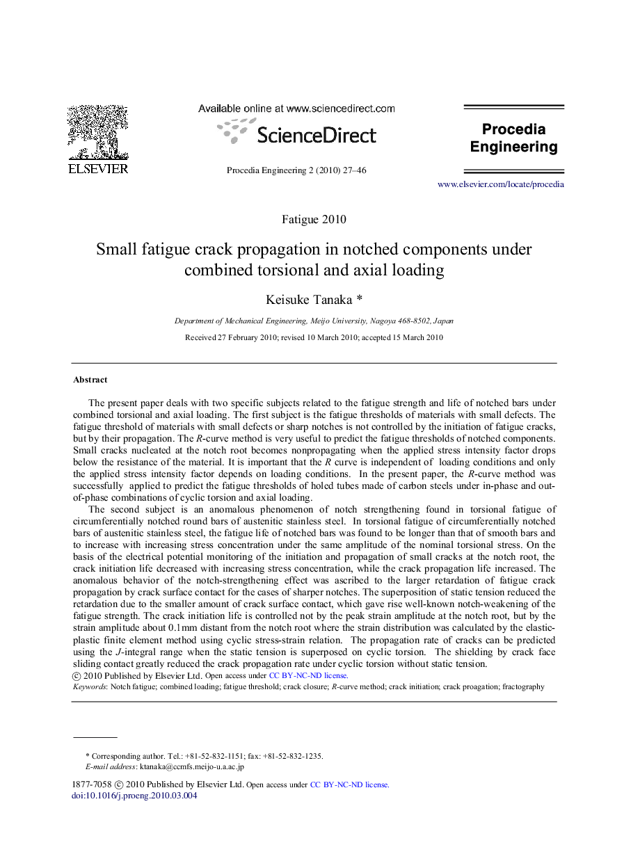 Small fatigue crack propagation in notched components under combined torsional and axial loading