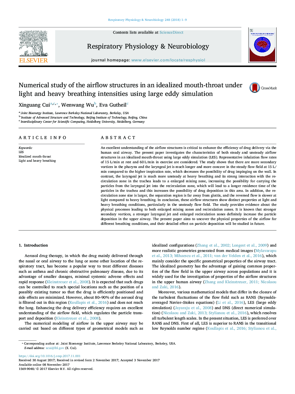 Numerical study of the airflow structures in an idealized mouth-throat under light and heavy breathing intensities using large eddy simulation