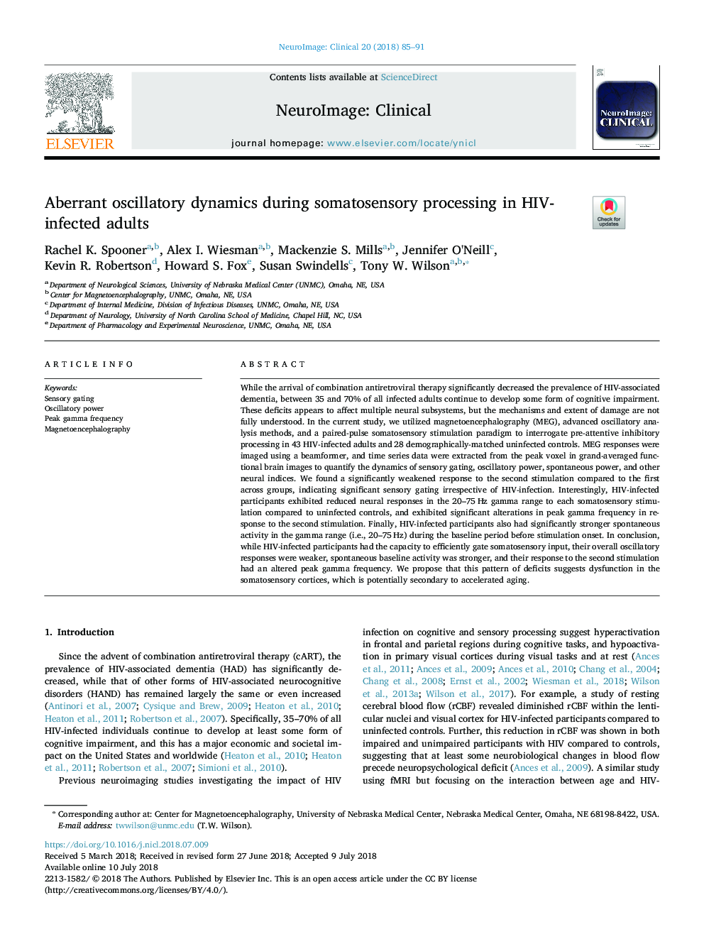 Aberrant oscillatory dynamics during somatosensory processing in HIV-infected adults