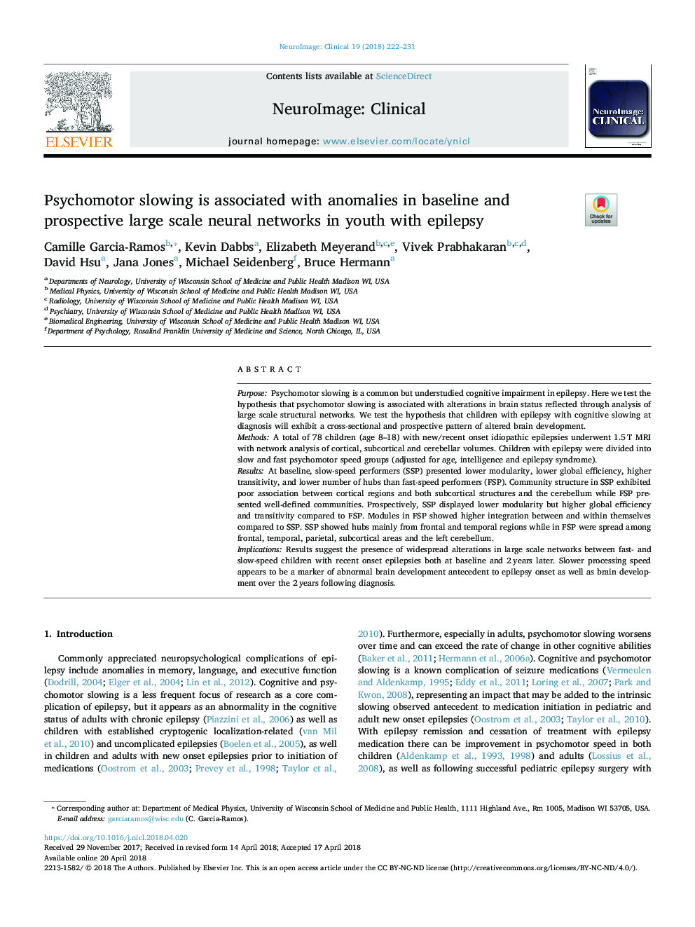 Psychomotor slowing is associated with anomalies in baseline and prospective large scale neural networks in youth with epilepsy