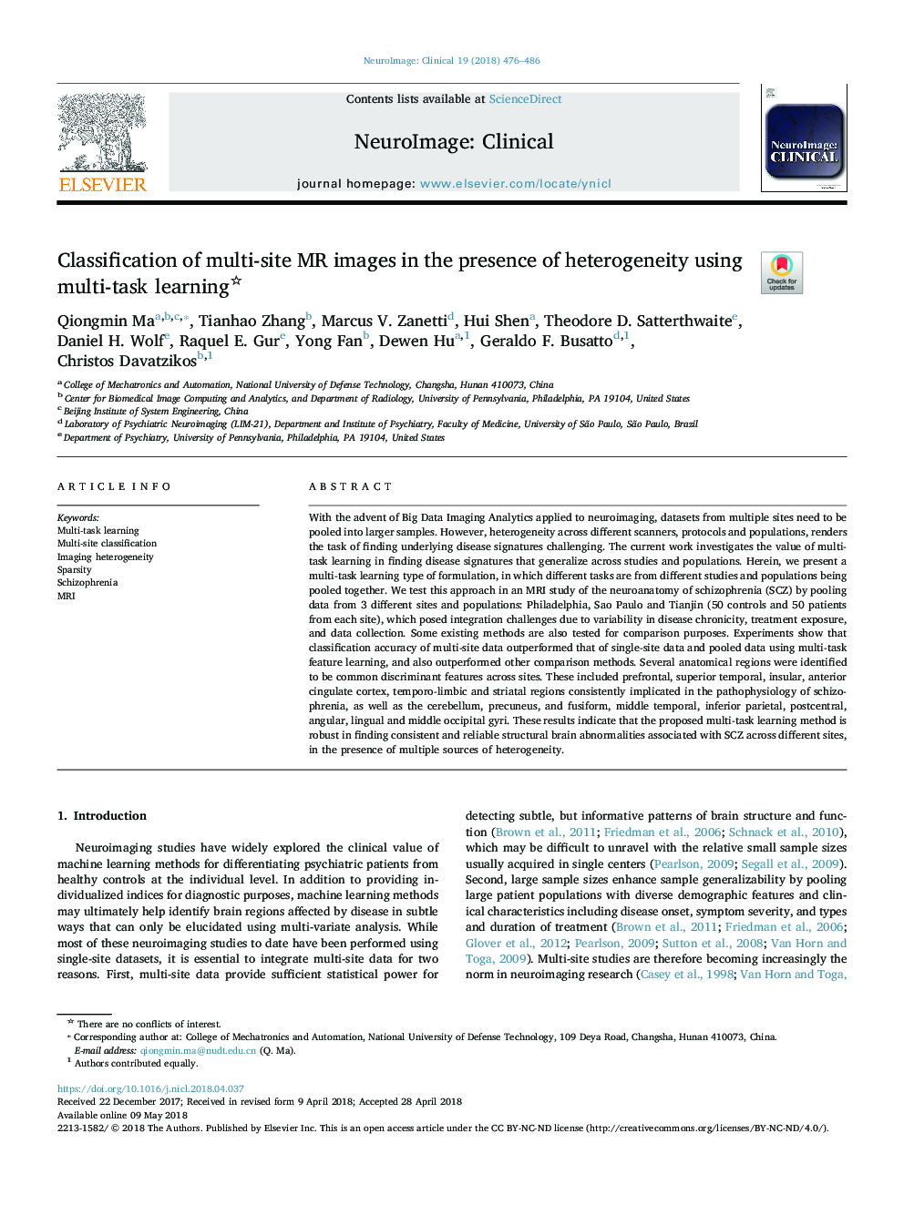 Classification of multi-site MR images in the presence of heterogeneity using multi-task learning