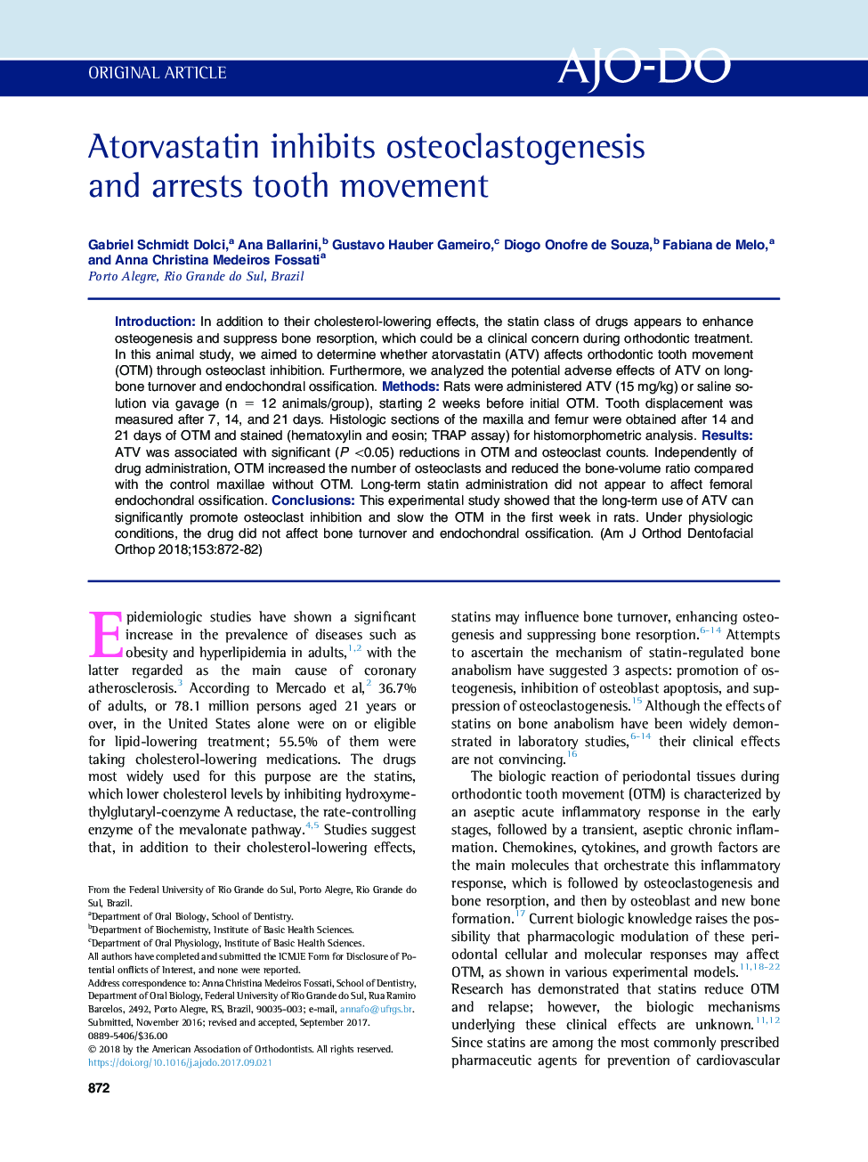 Atorvastatin inhibits osteoclastogenesis and arrests tooth movement