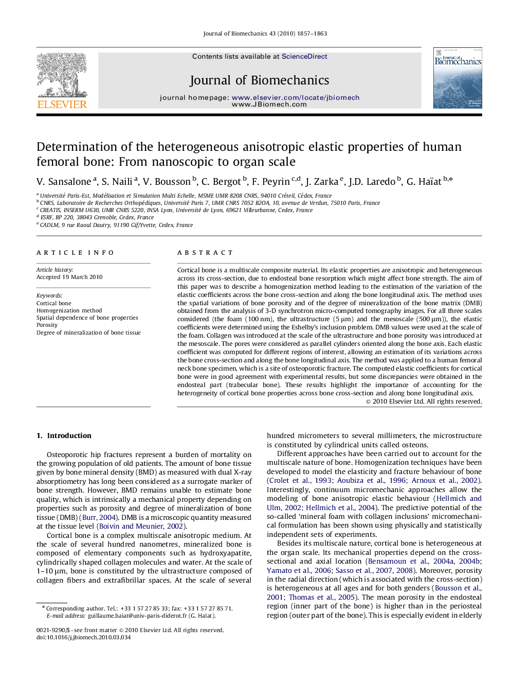 Determination of the heterogeneous anisotropic elastic properties of human femoral bone: From nanoscopic to organ scale