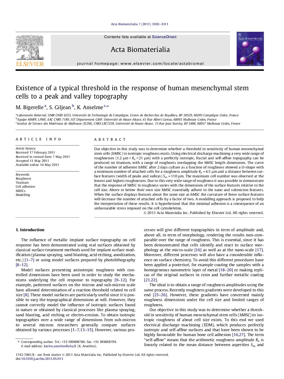 Existence of a typical threshold in the response of human mesenchymal stem cells to a peak and valley topography