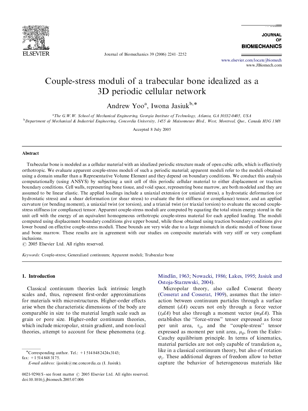 Couple-stress moduli of a trabecular bone idealized as a 3D periodic cellular network