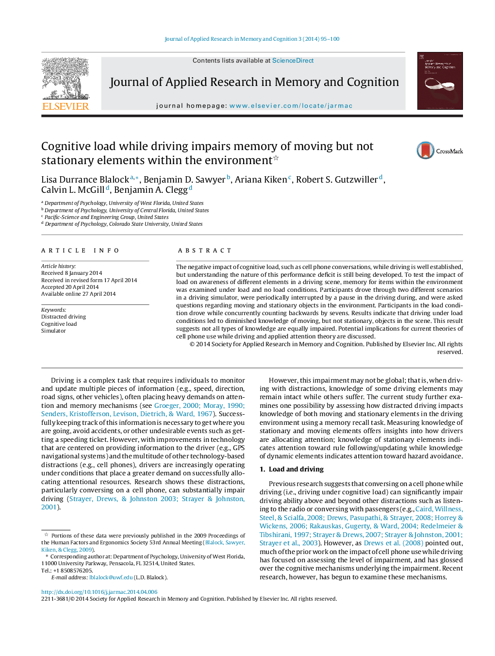 Cognitive load while driving impairs memory of moving but not stationary elements within the environment 