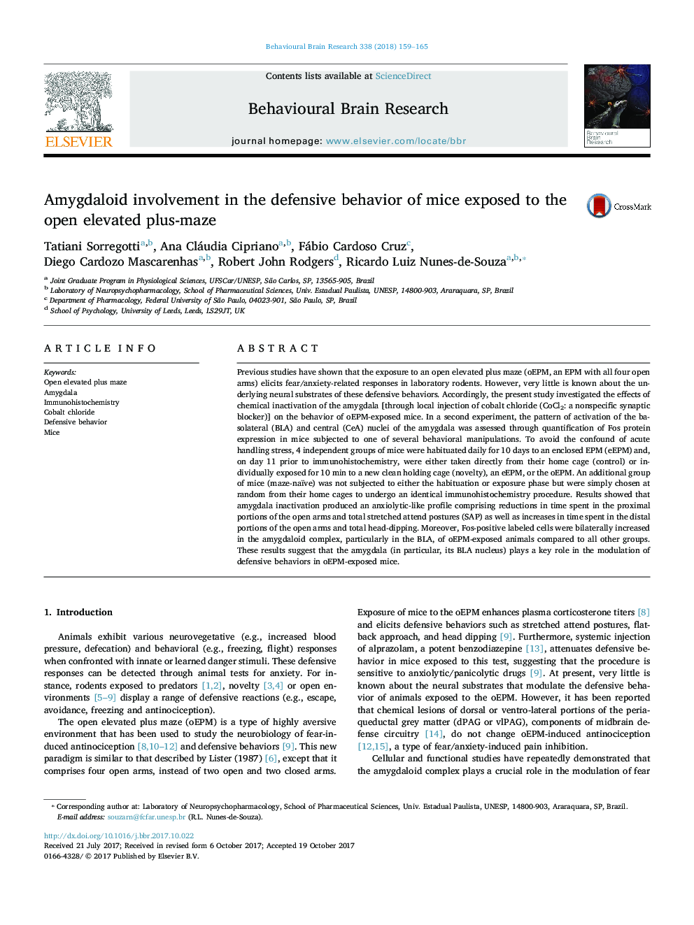 Amygdaloid involvement in the defensive behavior of mice exposed to the open elevated plus-maze